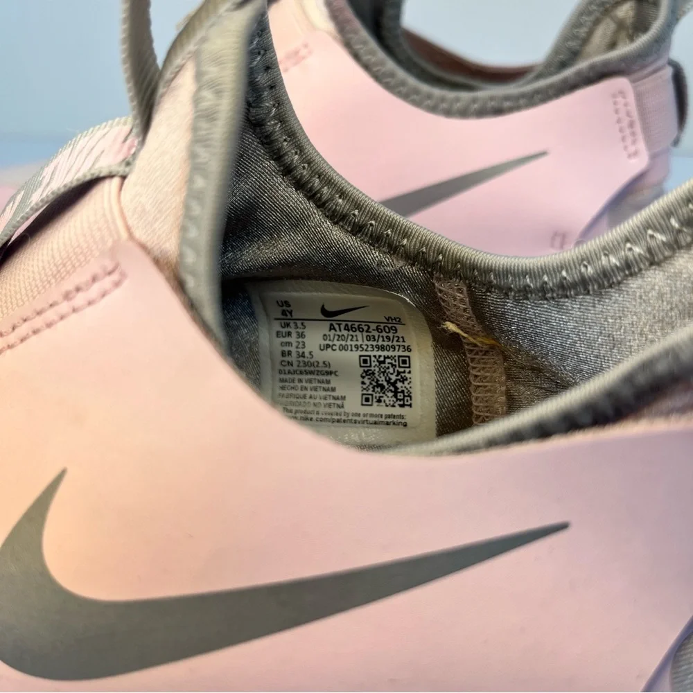Nike Pink‎ Slip-On Sneakers with Streamlined Design